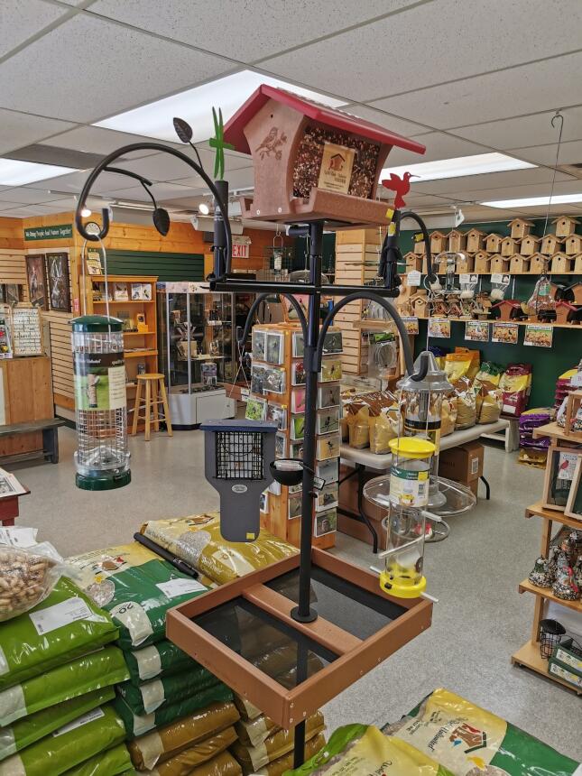 Inside Wild Birds Unlimited Victoria: feeder pole displays, seed and birdhouses