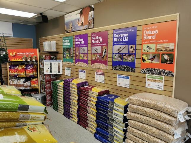 Wall of bird seed bags
